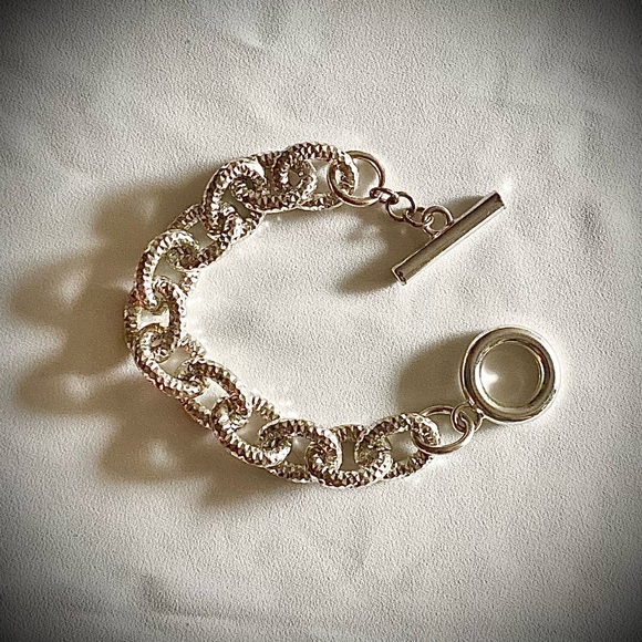 NWOT SILVER COLOR BRACELET - Picture 2 of 3